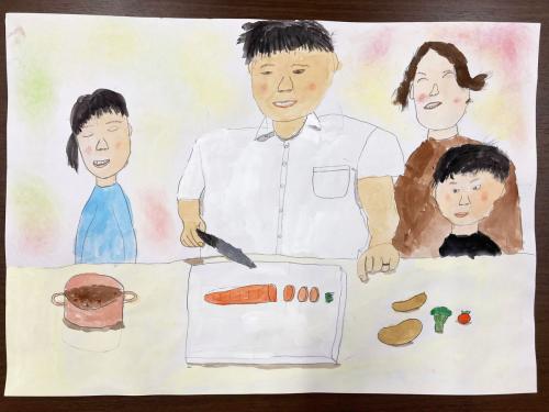 カレーを作っている家族